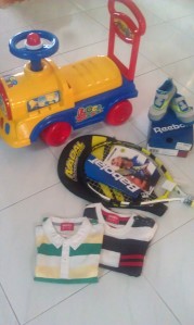 your birthday presents! - Babolat racquet from daddy, clothes from grandparents, shoes from auntie CY and bike from your ah pek.